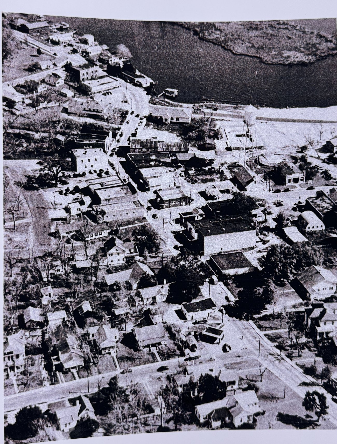 A 1948 aerial photograph of downtown Moss Point from above, the river along one edge.