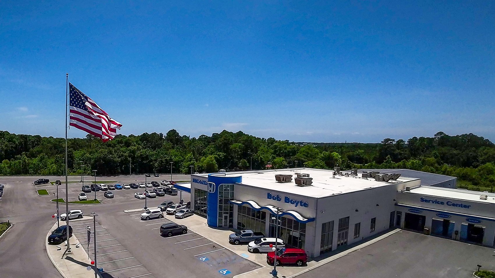 Aerial drone view of the Honda dealership on Hwy 63