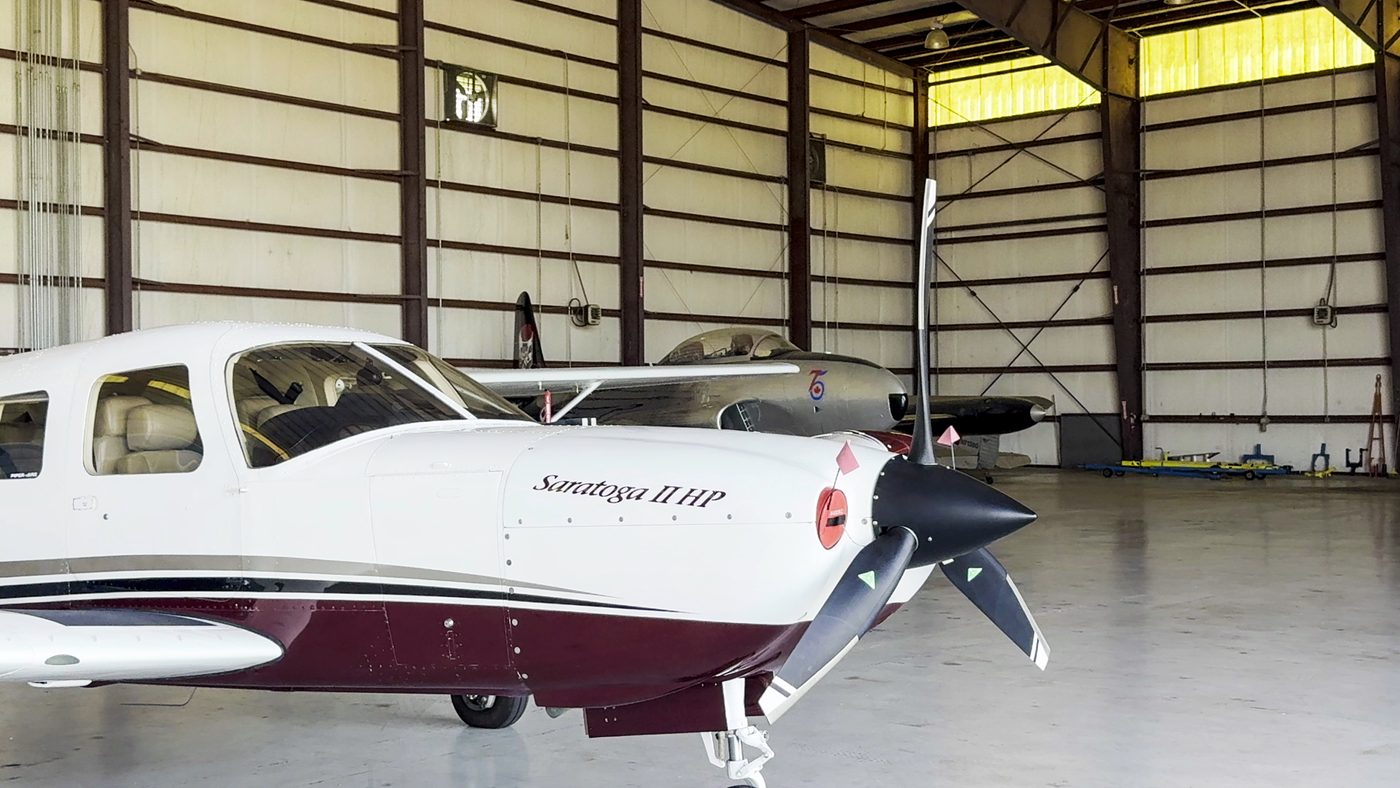 A general aviation aircraft inside a hangar at Trent Lott International Airport
