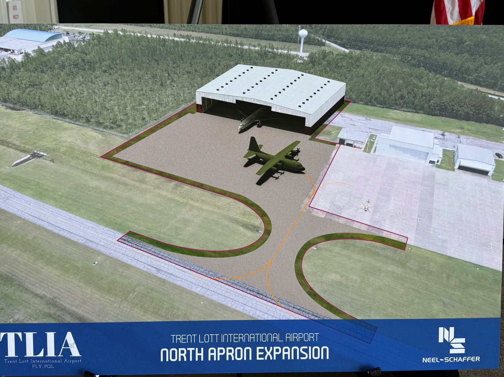 North apron expansion concept showing a large new hangar with a C-130 aircraft