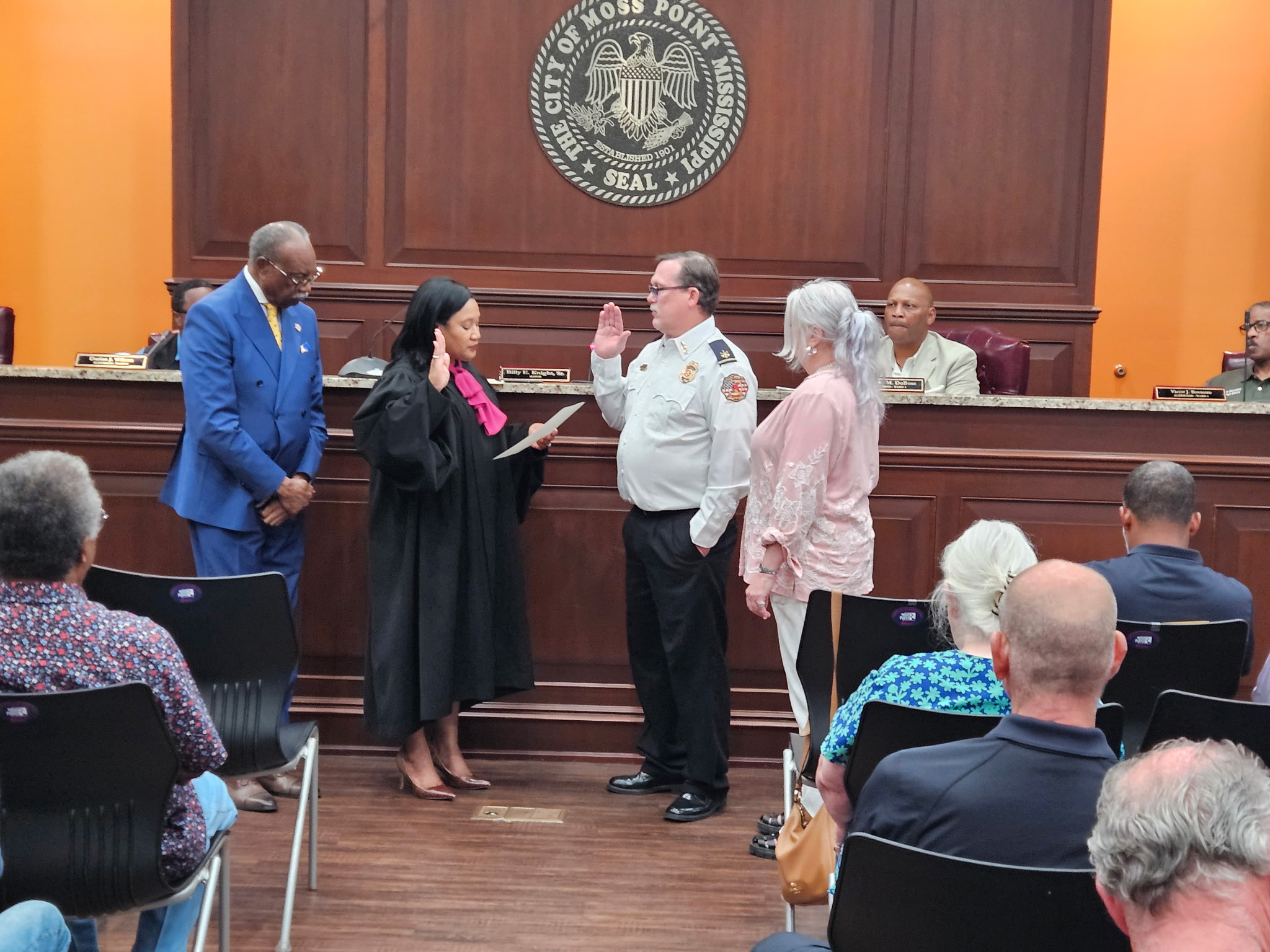 Interim Fire Chief David Eaker taking the oath of office at the Moss Point Board of Aldermen meeting on April 21, 2026, beneath the official City of Moss Point seal.