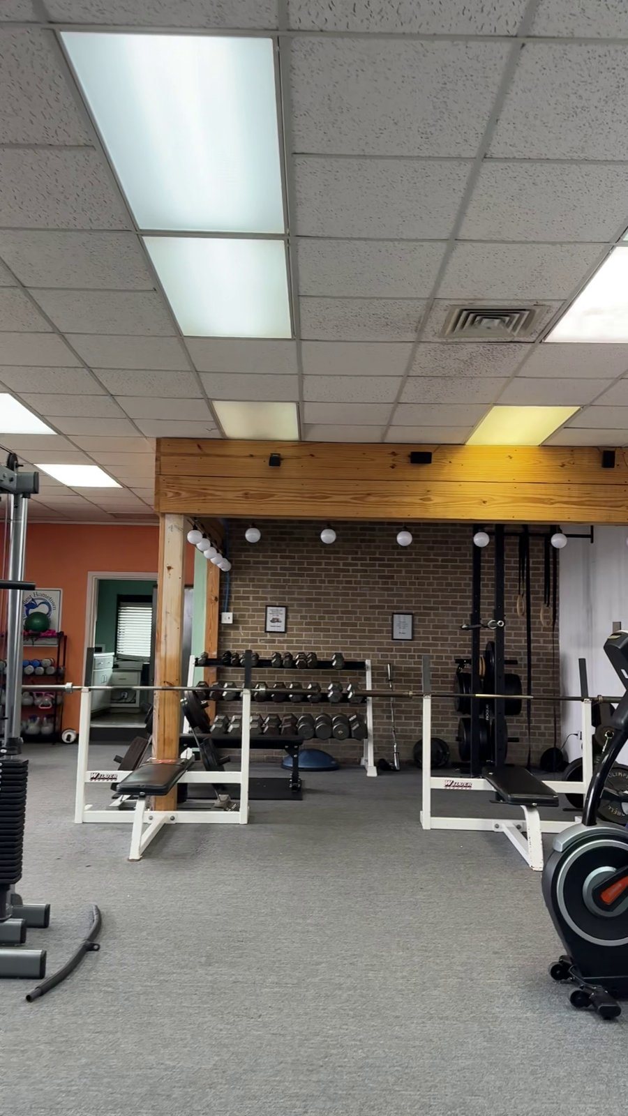 Strength machines and weight floor